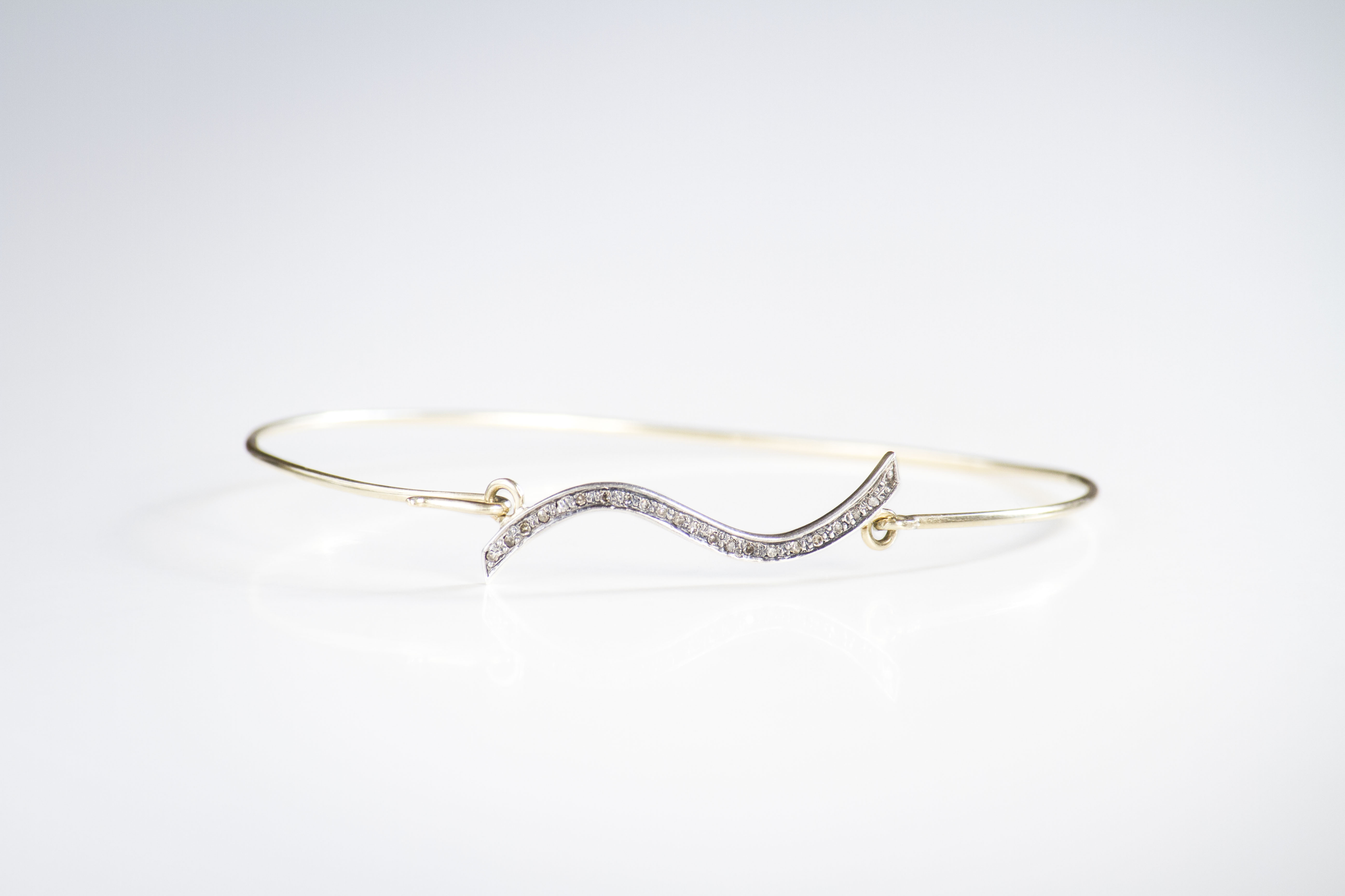 wave bracelet Delicate bangle in 14k yellow gold with diamond pave