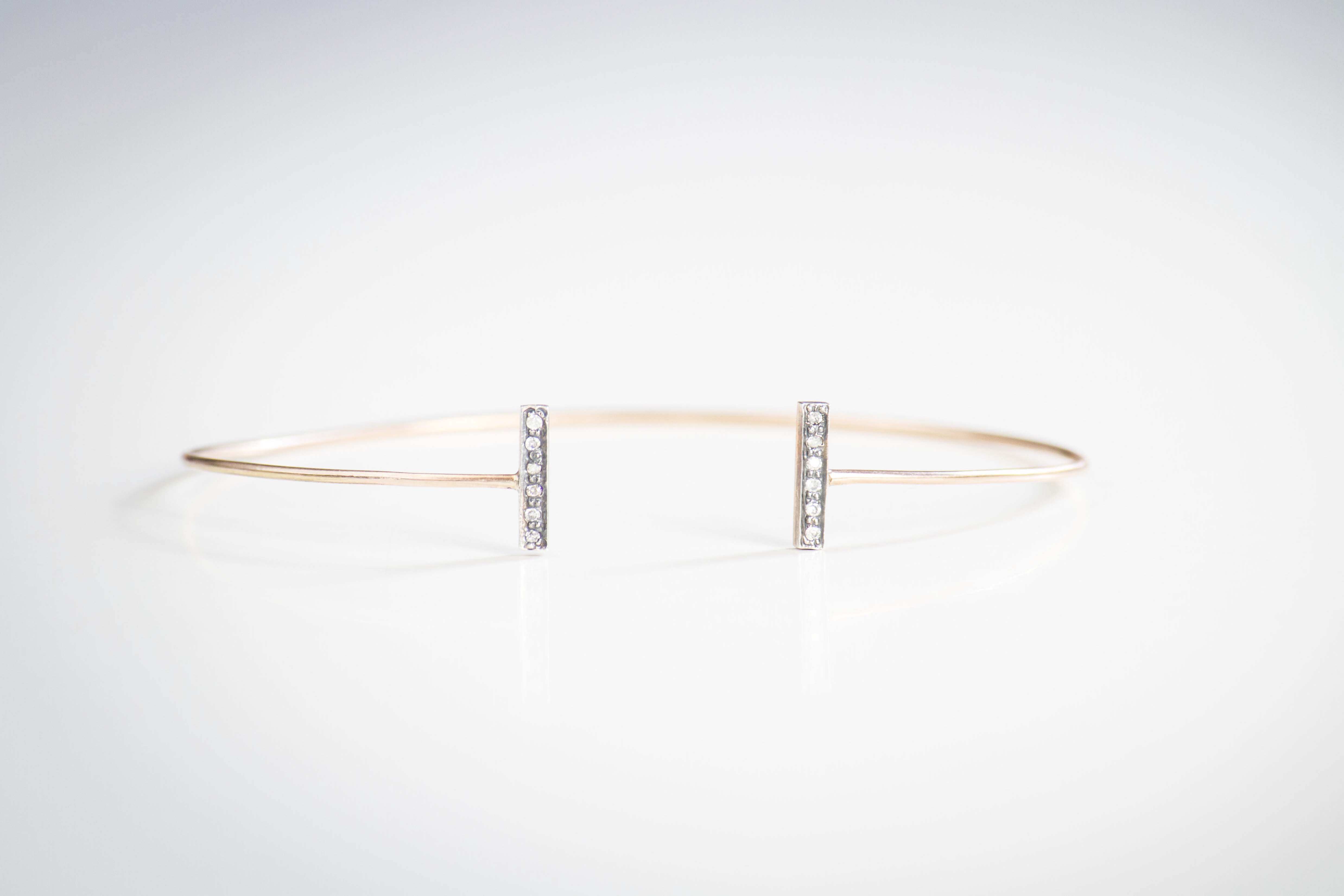 balance bracelet Pure lines for this bracelet crafted in 14k rose gold with diamond pave